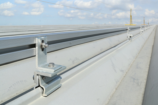Clip locks installed on Metal sheet roof for Solar PV Panel Installation