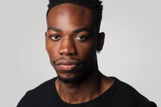 istock Studio Portrait Of Young African Man 1338987029