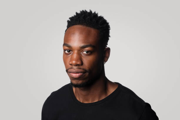 istock Studio Portrait Of Young African Man 1338987033