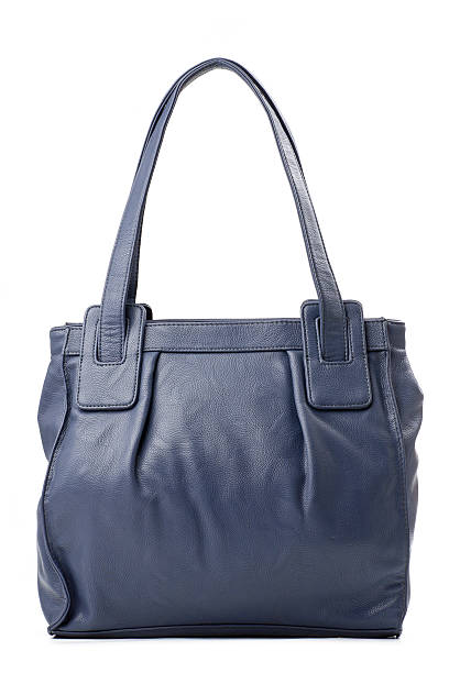 istock Blue leather female bag over white 133898738