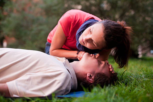 istock First aid - Look, listen and feel for breathing. 133898944