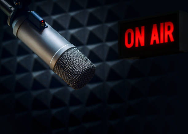istock Professional microphone and on air sign 1338990836