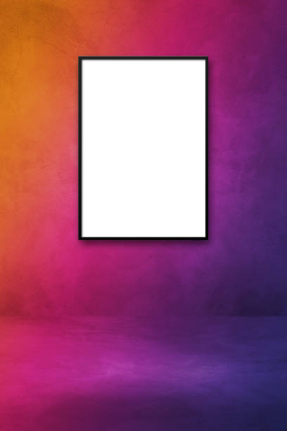istock Black picture frame hanging on a purple gradient wall 1338994352