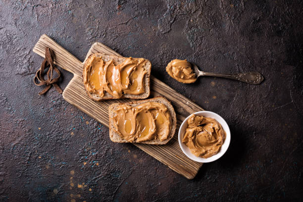 istock Sweet peanut paste or butter with honey 1338998501