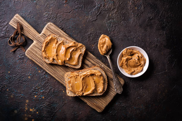 istock Sweet peanut paste or butter with honey 1338998523