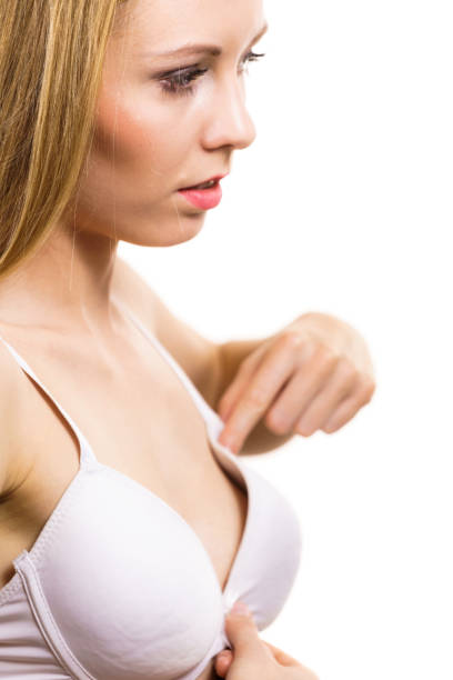 istock Female wearing too big bra 1338999931
