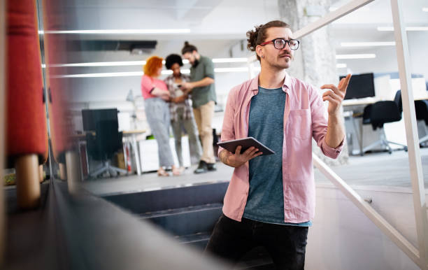 istock Man working in office, trying to solve problems. Business, technology people concept 1339002083