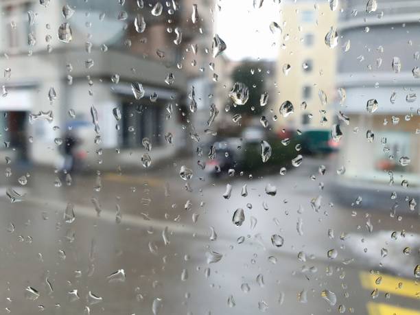 Zurich city captured during a rainy day. The image was made through a window of a tram.