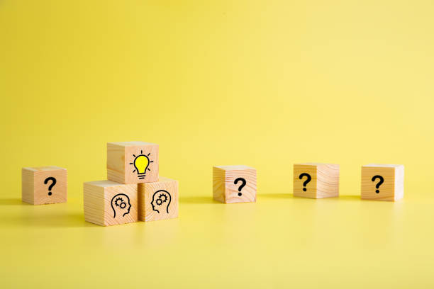 istock Lightbulb icon and brainstorming print screen on wooden block cube. It is creative thinking idea and innovation concept. 1339014013