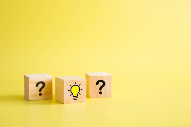 istock Lightbulb icon and question mark print screen on wooden block cube. It is creative thinking idea and innovation concept. 1339014018