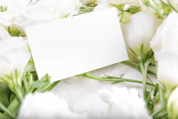 istock empty card mockup with blooming white eustoma lisianthus flowers 1339014226