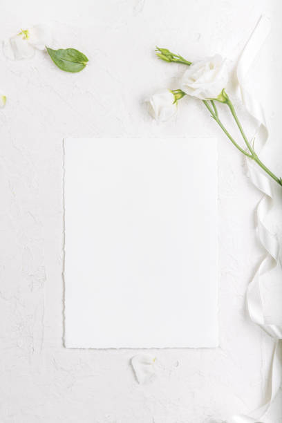 istock empty card mockup with blooming white eustoma lisianthus flowers 1339014229