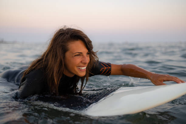 istock Happy Caucasian women surfing while on a vacation 1339014489