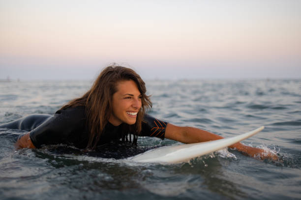 istock Happy Caucasian women surfing while on a vacation 1339014558
