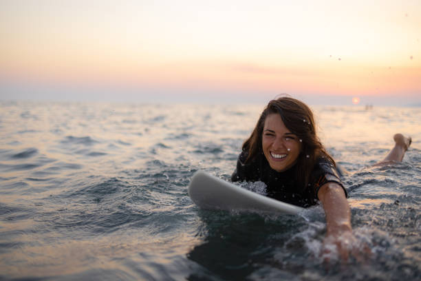 istock Happy Caucasian women surfing while on a vacation 1339015175
