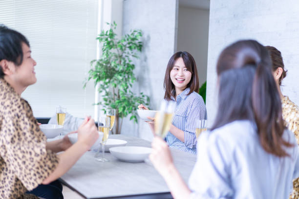 istock Young man and woman having dinner together 1339016934