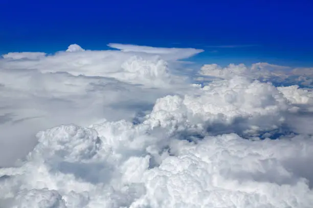 Cumulus sea of clouds view from aerial view aircraft point of view