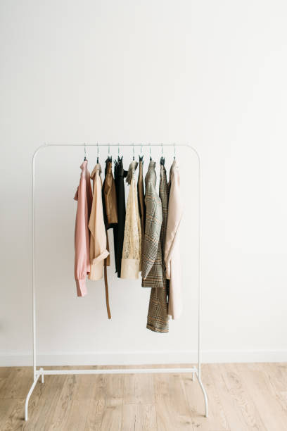 istock Rack with capsule clothes in beige colors 1339017238