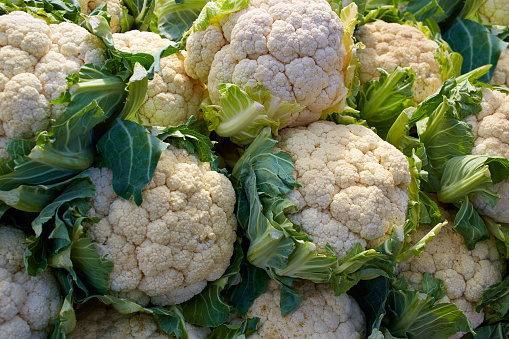 cauliflower cabbage texture pattern stacked in a row at market outdoor