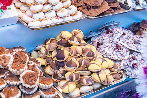 assorted sweets at christmas market sweets and pastries selective focus