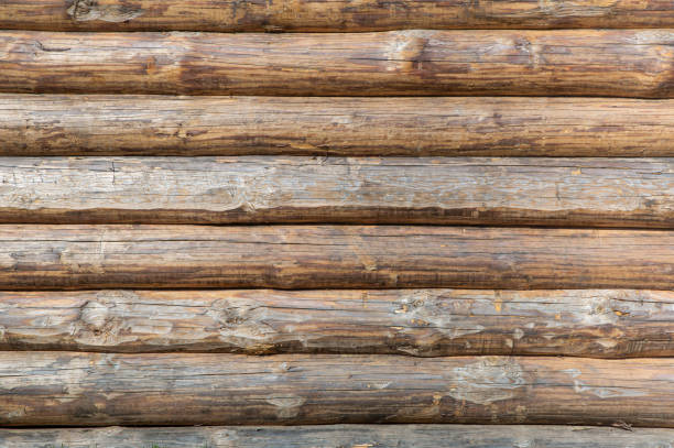 istock wooden background from horizontal logs stacked in parallel 1339021662