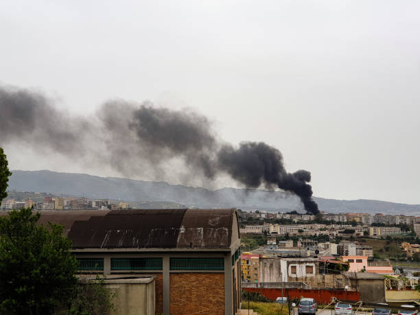 istock fire smoke over the city - landscape 1339022095