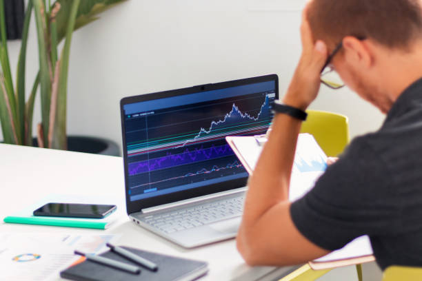 istock young male investor working with notebook in office worried 1339023111