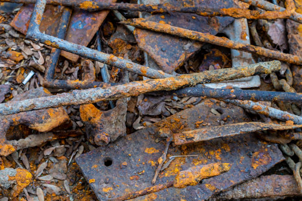 istock steel bar and plate covered with rusty on the ground close up 1339026469