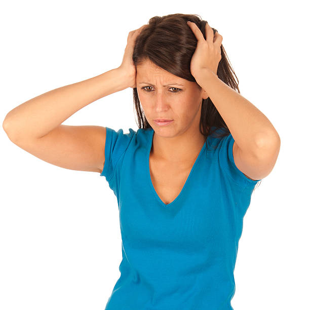 istock Girl with headache isolated on white background 133902761