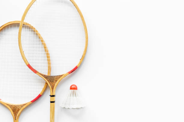 istock Competitive sports concept with badminton rackets and shuttlecock 1339033943