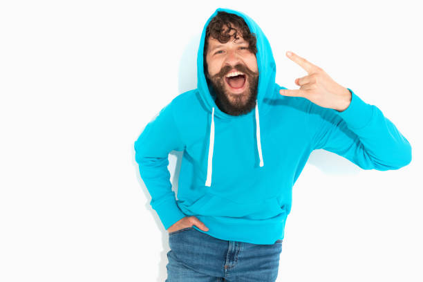 istock young casual man wearing his hood on 1339034264