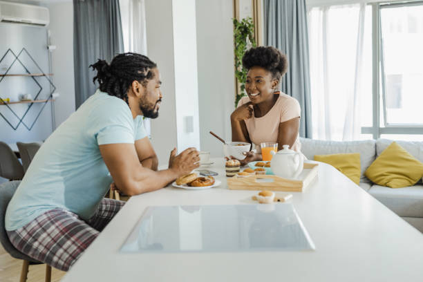 istock Couple having breakfast at home 1339035322