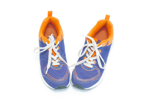 istock Pair of sneakers isolated on white background 1339035397