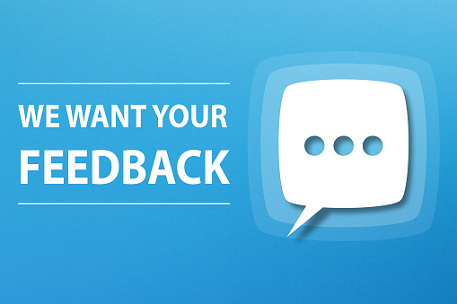 We Want Your Feedback concept with speech bubble on blue background