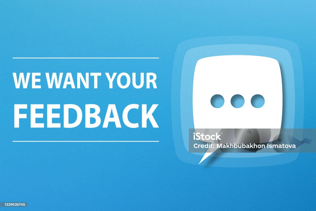 We Want Your Feedback concept with speech bubble on blue background Feedback Stock Photo