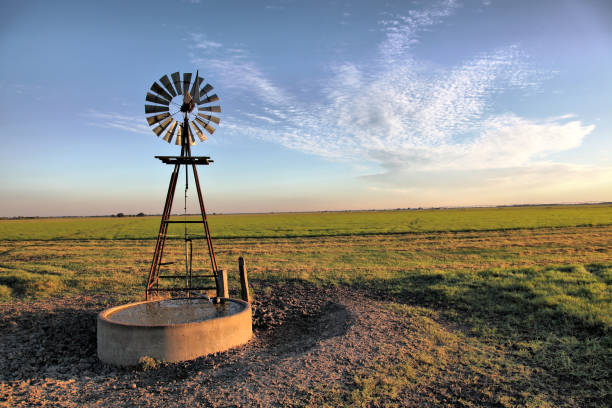 A windmill at sunrise near Clemsville Texas