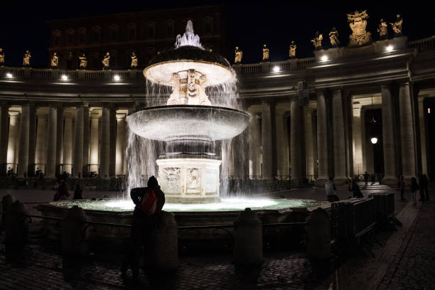 Fountain at St. Peter's Basilica, Vatican, night.