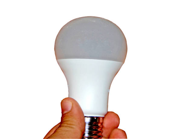 istock a person holds a light bulb in his hand - isolated on white 1339041503