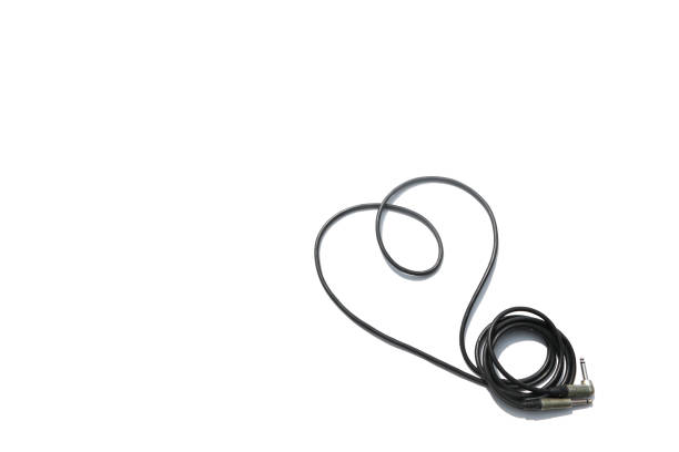 White earphones on violet background