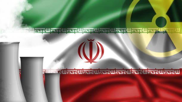 istock Iranian flag background with nuclear sign - Iran 1339052963