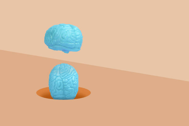 istock Minimal scene with  a blue human brains falling into a hole in the floor. 1339053929