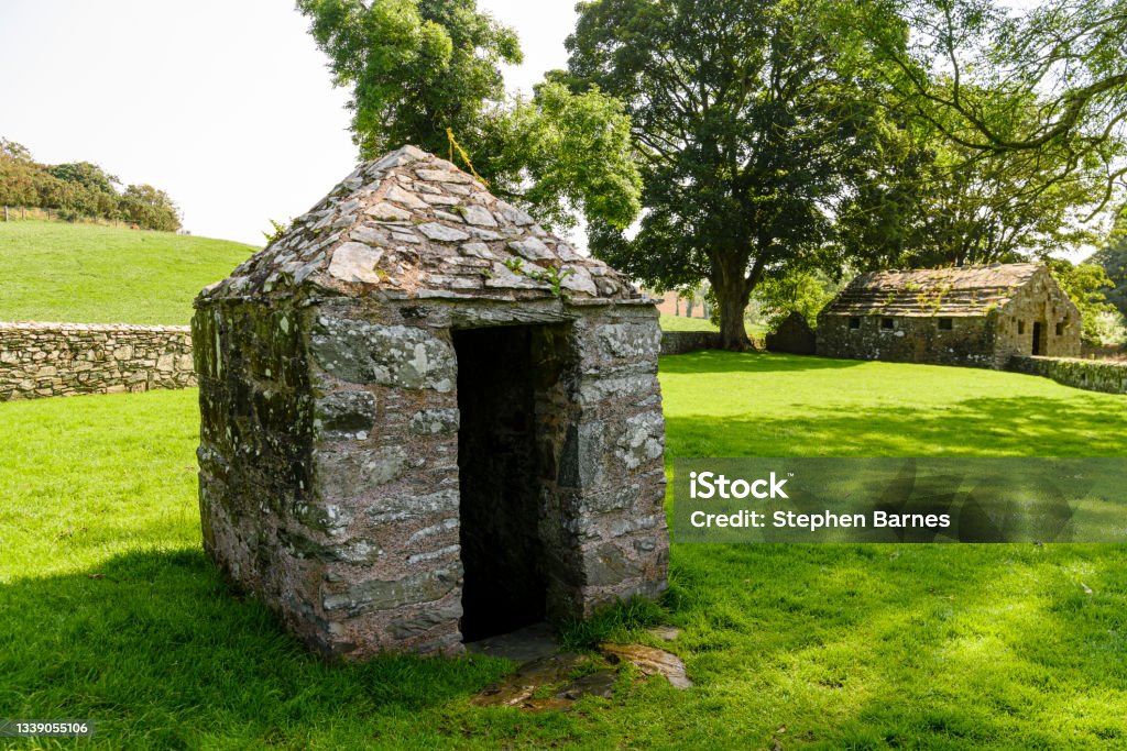 Struell Wells, Downpatrick, Northern Ireland. Struell Wells, Downpatrick, Northern Ireland.  An ancient holy well dating back hundreds of years, with ancient bath houses.  Pilgrims from all over Ireland visited the site in the belief the waters had healing powers. Ancient Stock Photo