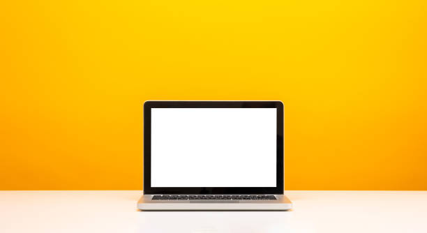 istock Education background concept. Laptop with blank screen on Yellow background. Banner design copy space. 1339055645