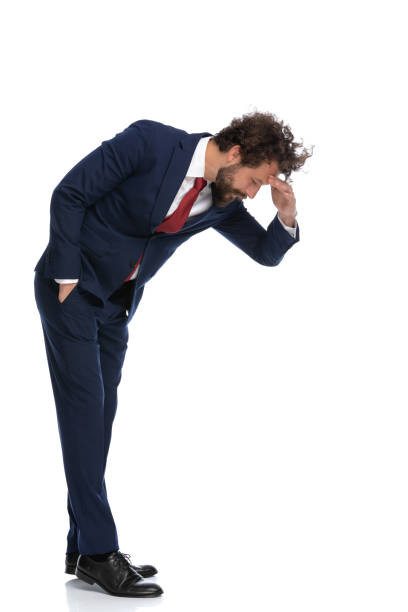 istock sexy businessman protecting his eyes while looking down on someone 1339057825