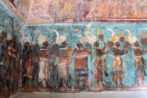 The walls were painted with kerosene which made the layer over the paintings temporarily transparent
