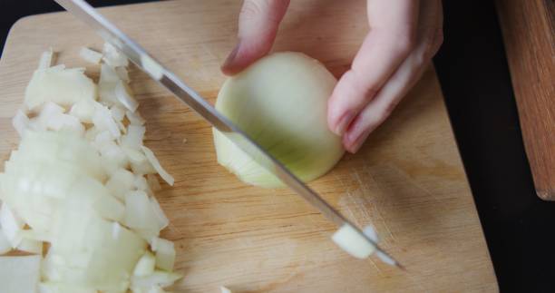 istock Making and serving vegetable soup in domestic kitchen 1339061208