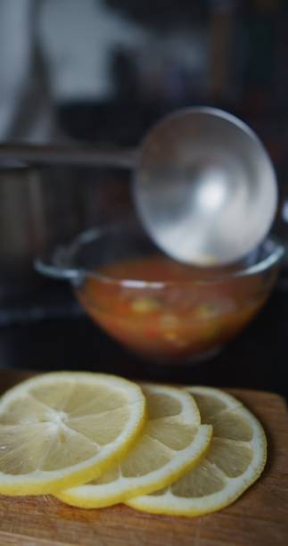 istock Making and serving vegetable soup in domestic kitchen 1339061336