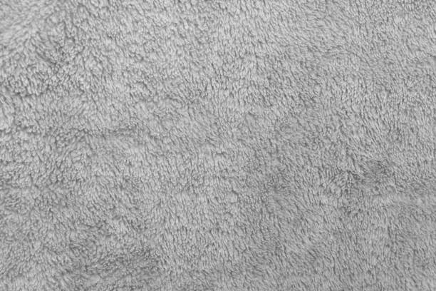 istock Modern white carpet fabric flooring pattern surface texture in office. Close-up of interior material for design decoration background 1339066984