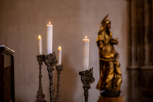 View of candles in a Church in Czech Republic.