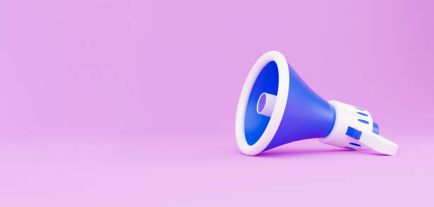 istock Megaphone on pink background. 3d render illustration with copy space. 3d render white and blue portable cordless megaphone lies on a pastel pink background. Getting your message through 1339074522